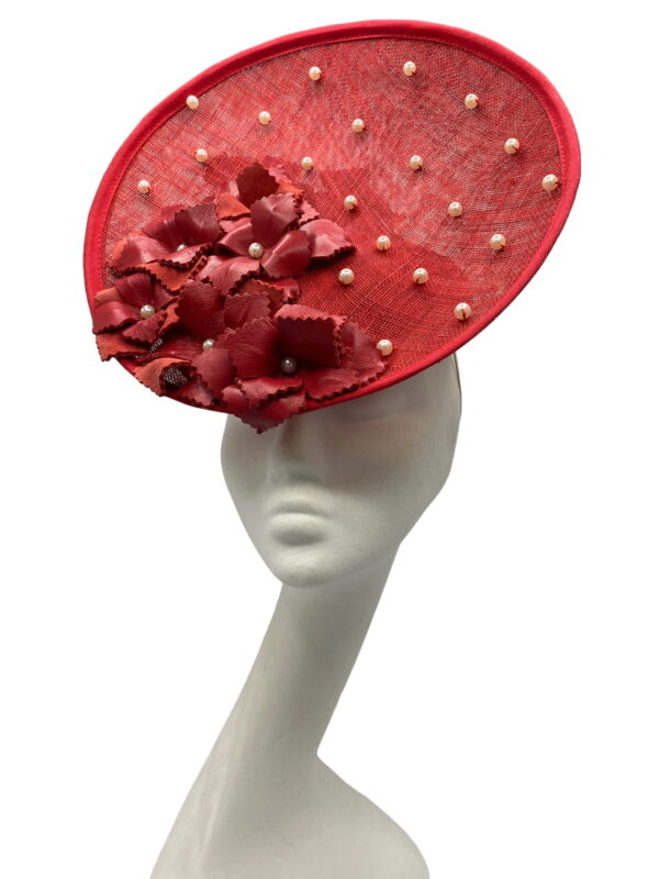 Red saucer percher headpiece with stunning red leather flower and pearl detail.